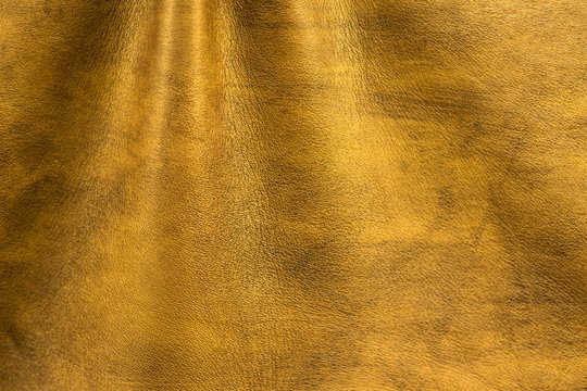 Texture cuir jaune dor&eacute; avec plis