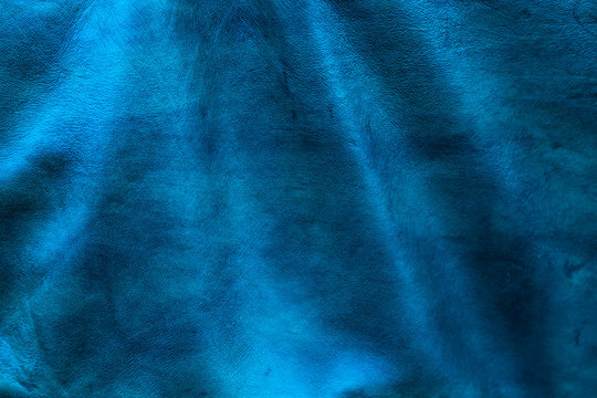Tetxture cuir bleu avec plis