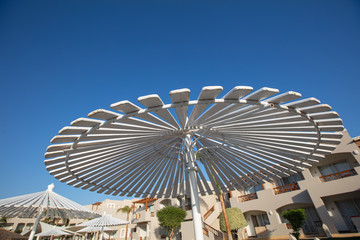 Fototapeta premium sunshade umbrella on sky background