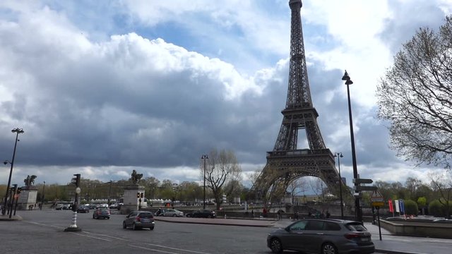 view of the Eiffel tower near Jena bridge across the river Seine, Paris