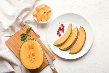Composition with sweet ripe melon on white background