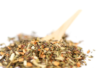 Heap of floral loose leaf herbal tea isolated on a white background