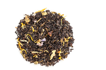 Overhead view on the heap of loose leaf black and green tea blend isolated on a white background