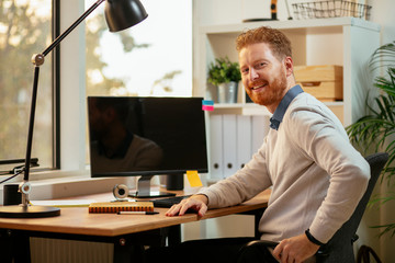 Fototapeta premium Businessman posing in the office