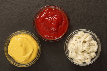 Mustard, ketchup and tartar sauce