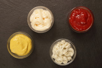 Mustard, mayonnaise, tartar sauce and ketchup
