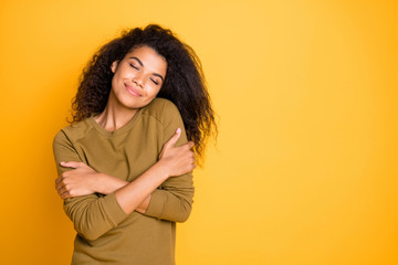 Photo of casual cheerful brunette nice charming sweet pretty affectionate girlfriend enjoying company of her own in her favorite sweater isolated over vivid color background