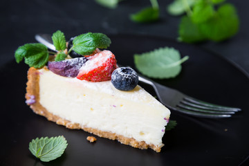 Cheesecake with Fresh Berries and Mint