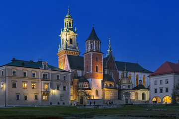 Fototapeta na wymiar Krakow, Poland. Wawel Cathedral or The Royal Archcathedral Basilica of Saints Stanislaus and Wenceslaus on Wawel Hill in twilight.