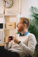 Close up of businessman drinking coffee