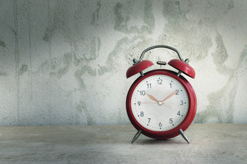 Vintage clock on wood background