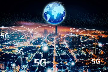 aerial view city at  night  and 5g network  tech concepts