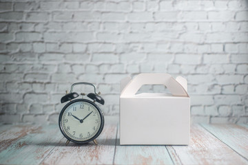 Takeaway Time Concept - Blank Takeaway box and alarm clock