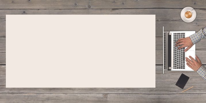 Business concept - top view of business people. White blank in the middle of the wooden table. Copy space for your text.
