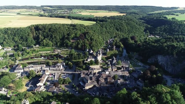 Aerial view of world heritage Durbuy Castle located in Belgium, province of Luxembourg in the Wallonia region. Beautiful landscape with river, sunny weather during summer season.