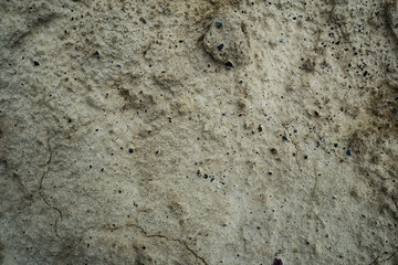 Texture of dried cracked clay. Macro background image of dried clay