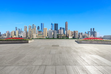 Obraz premium Empty floor and modern city financial district in Chongqing,China.