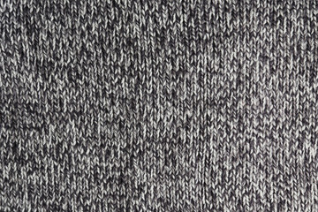 Cropped close up shot of seamless woolen knitting pattern of fall / winter season warm sweater,...