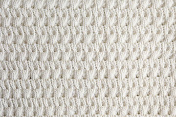 Cropped close up shot of seamless woolen knitting pattern of fall / winter season warm sweater,...