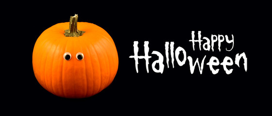 Happy Halloween sign on a black background. Halloween pumpkin with eyes stock images. Black banner...