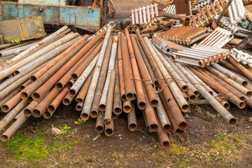 Scrap metal waste is stored in a recycling yard