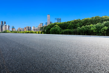 Fototapeta na wymiar Empty asphalt highway and modern city financial district skyline in chongqing,China.