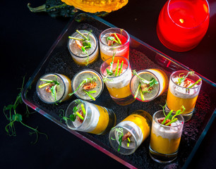 Spicy pumpkin puree with mushroom mousse and bacon chips