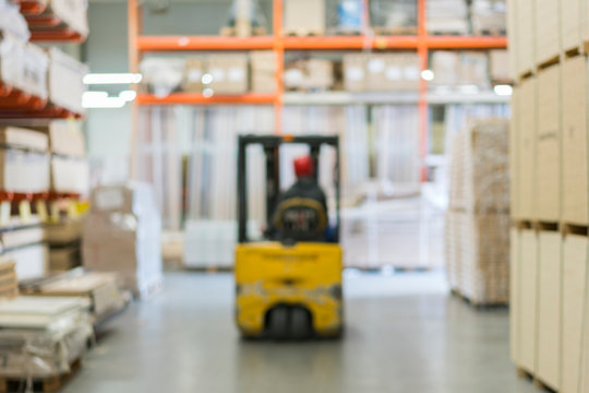 Forklift in a hardware store. Blurry
