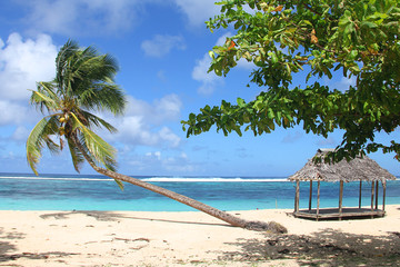 Beach fale, a simple open 'hut' (faleo'o Samoan language), popular in budget eco-tourism in Samoa. Beautiful day fale at Upolu island © peacefoo
