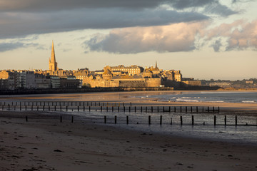 The morning light on the Plage du Sillon and walled city. Saint Malo , France, Ille et Vilaine,...