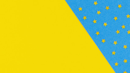 Yellow stars on blue background with copy space