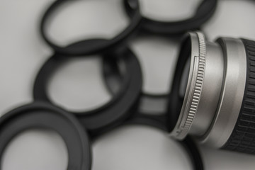 Lens and adapter rings for lenses