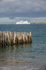 Big breakwater, 3000 trunks to defend the city from the tides, Plage de l'Éventail beach in...