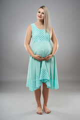 Studio portrait of a pregnant woman