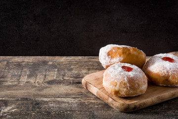 Hanukkah sufganiyot. Traditional Jewish donuts for Hanukkah. Copy space