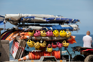 Helmets and surf boards at the school of surf in Saint Malo, Brittany, France