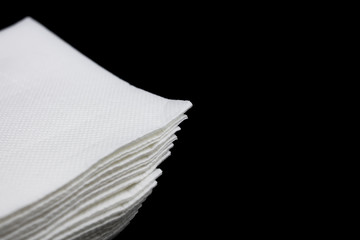 Corner of a lot of clean white napkins