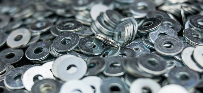 Set of metal washers in the foreground