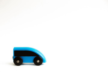 Cute blue toy train on a white background