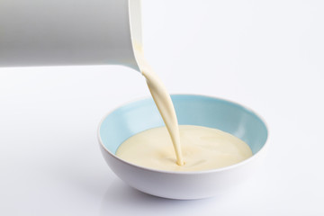Vanilla cream in blue vessel