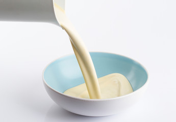 Vanilla cream in blue vessel