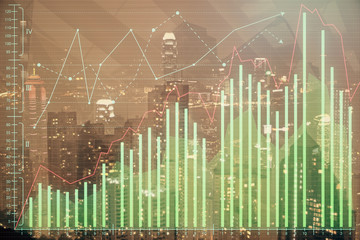 Double exposure of forex chart drawings over cityscape background. Concept of success.