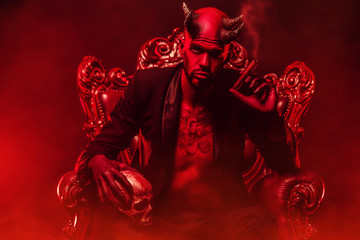 red devil on the throne