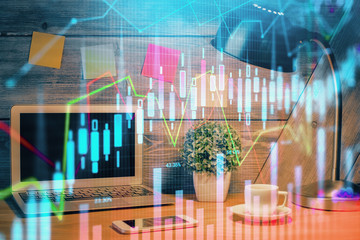 Multi exposure of graph and financial info and work space with computer background. Concept of...