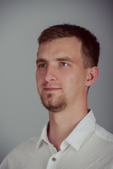 Obraz premium Portrait of a smiling young man
