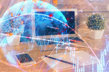 Multi exposure of forex graph and work space with computer. Concept of international online trading.