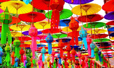 Fototapeta na wymiar the colorful umbrella and paper vintage lantern for in Thai style