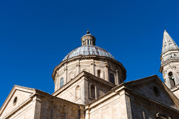 Fototapeta na wymiar The dome of Chiesa di San Biagio, a small Renaissance church in it Montepulciano against the blue sky, Tuscany, Italy.