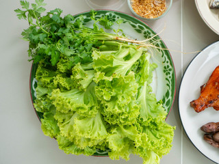 Lettuce and coriander is healthy for body,Ingredient Thai food name is Maing PLA-too or salad fried fish,Street food in Bangkok