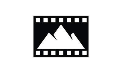 Fototapeta premium Iconic Film Strip Frame Showcasing Mountain Landscape Graphic Design in Simple Black and White